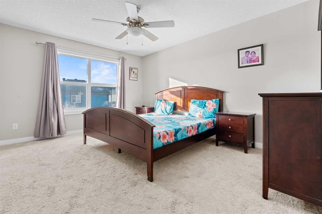 8487 Saddlebrook Drive Ne, Calgary, AB - Indoor Photo Showing Bedroom