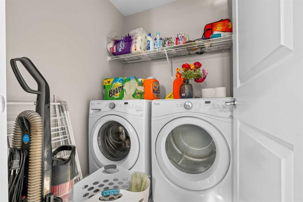 8487 Saddlebrook Drive Ne, Calgary, AB - Indoor Photo Showing Laundry Room