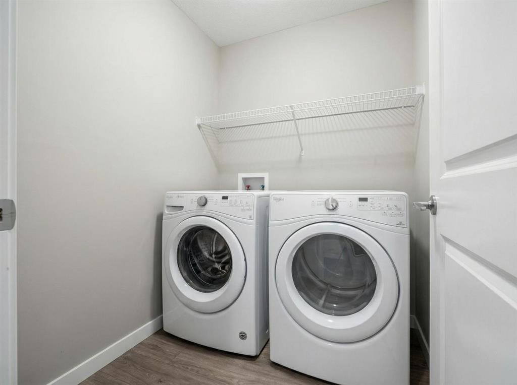 8487 Saddlebrook Drive Ne, Calgary, AB - Indoor Photo Showing Laundry Room
