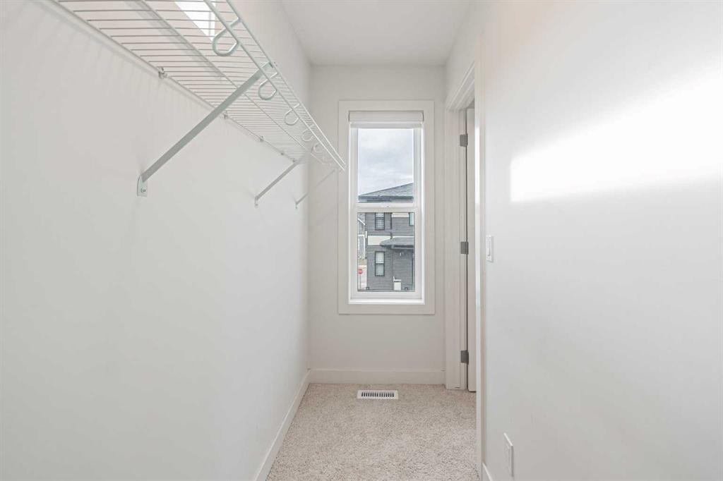 101-550 Seton Circle Se, Calgary, AB - Indoor Photo Showing Other Room