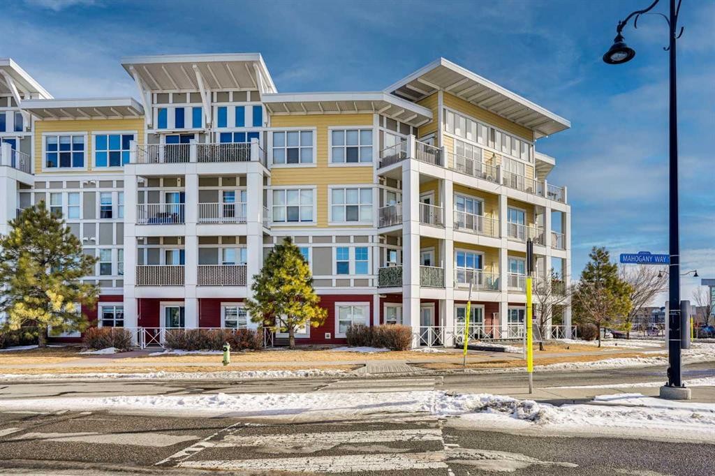 208-402 Marquis Lane Se, Calgary, AB - Outdoor With Balcony With Facade