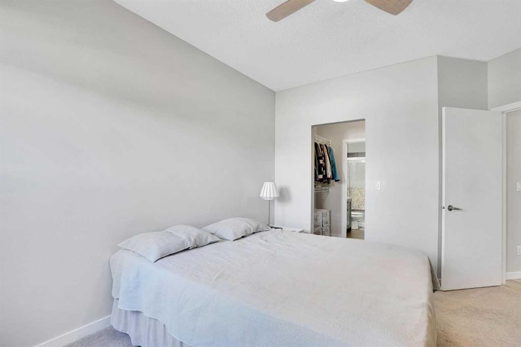 208-402 Marquis Lane Se, Calgary, AB - Indoor Photo Showing Bedroom