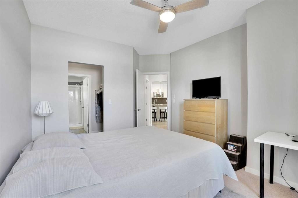 208-402 Marquis Lane Se, Calgary, AB - Indoor Photo Showing Bedroom