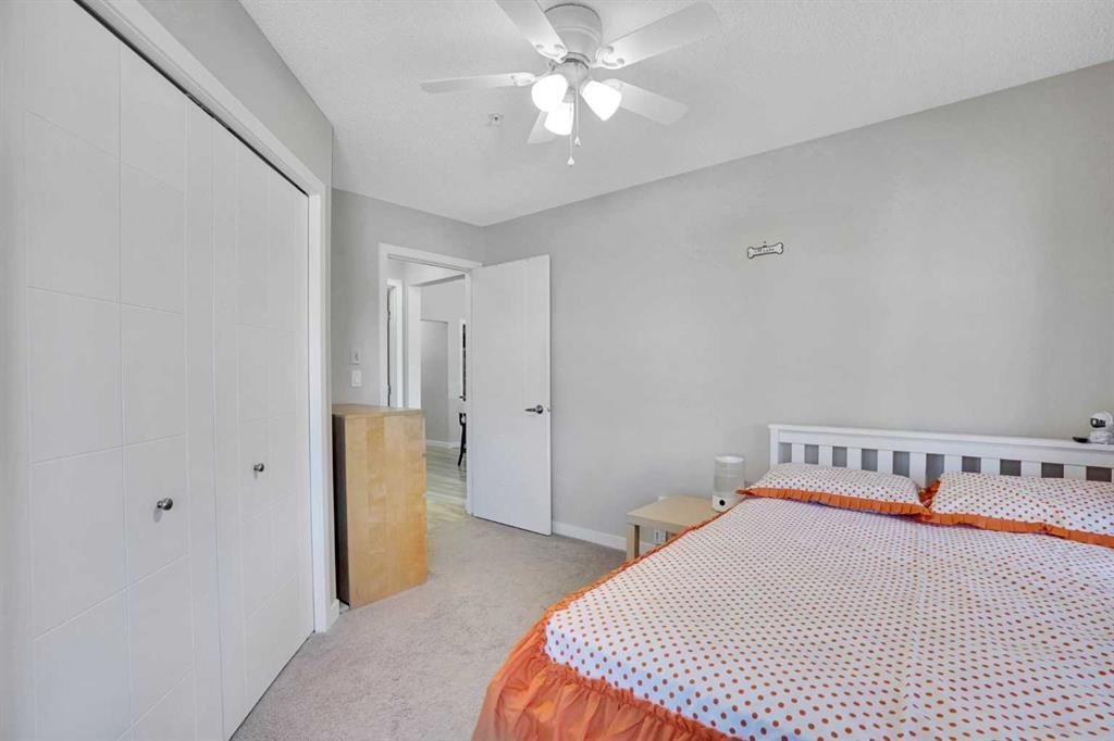 208-402 Marquis Lane Se, Calgary, AB - Indoor Photo Showing Bedroom