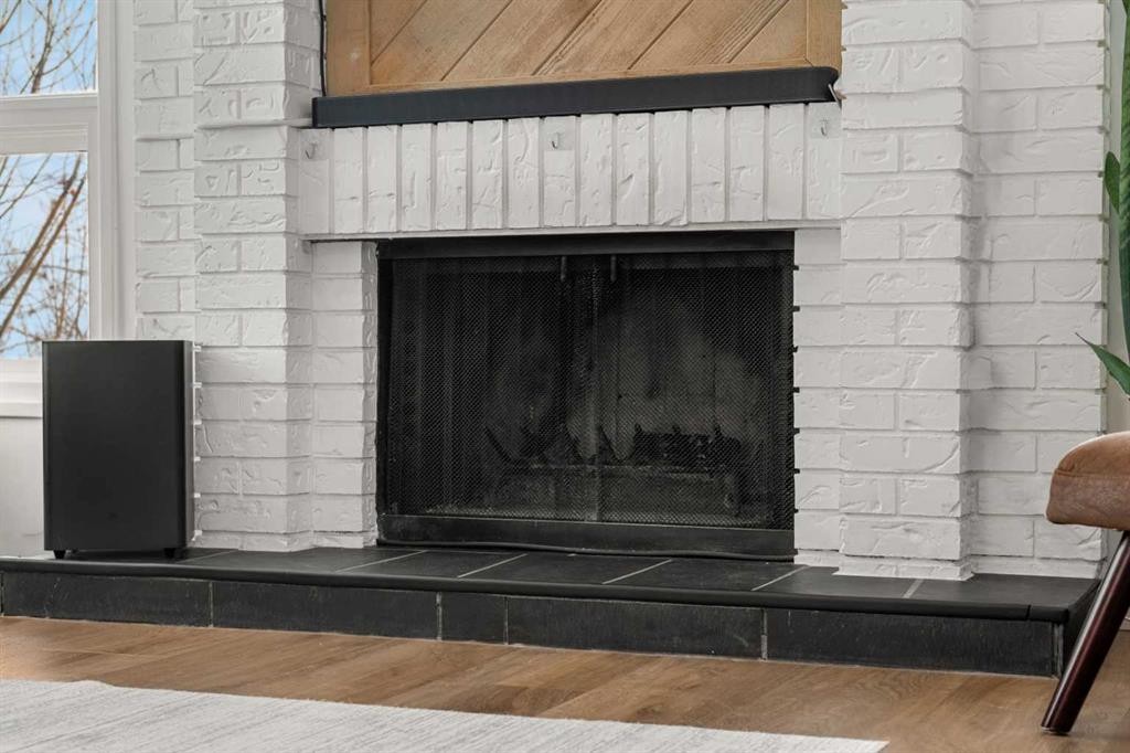 55 Coach Gate Way Sw, Calgary, AB - Indoor With Fireplace