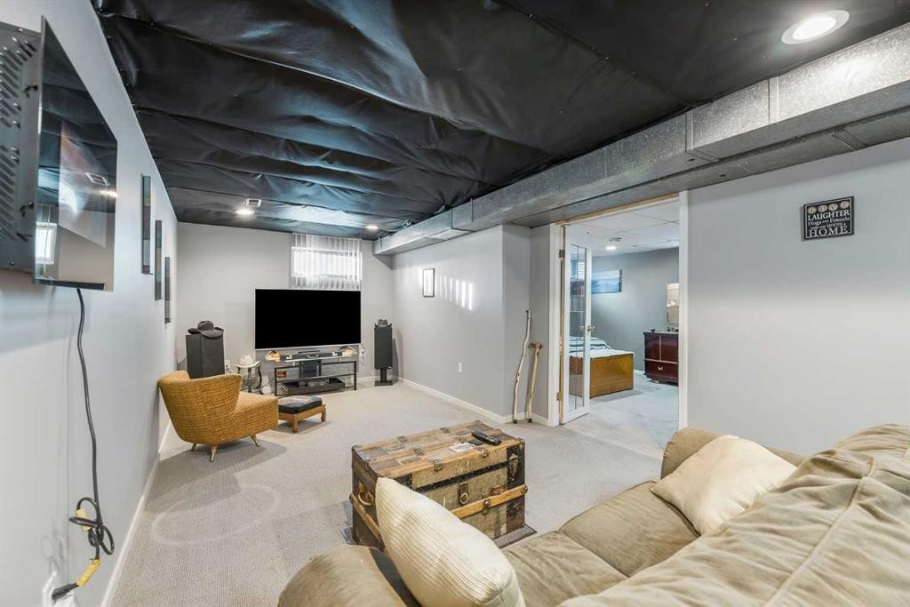 126 Springwood Drive Sw, Calgary, AB - Indoor Photo Showing Basement