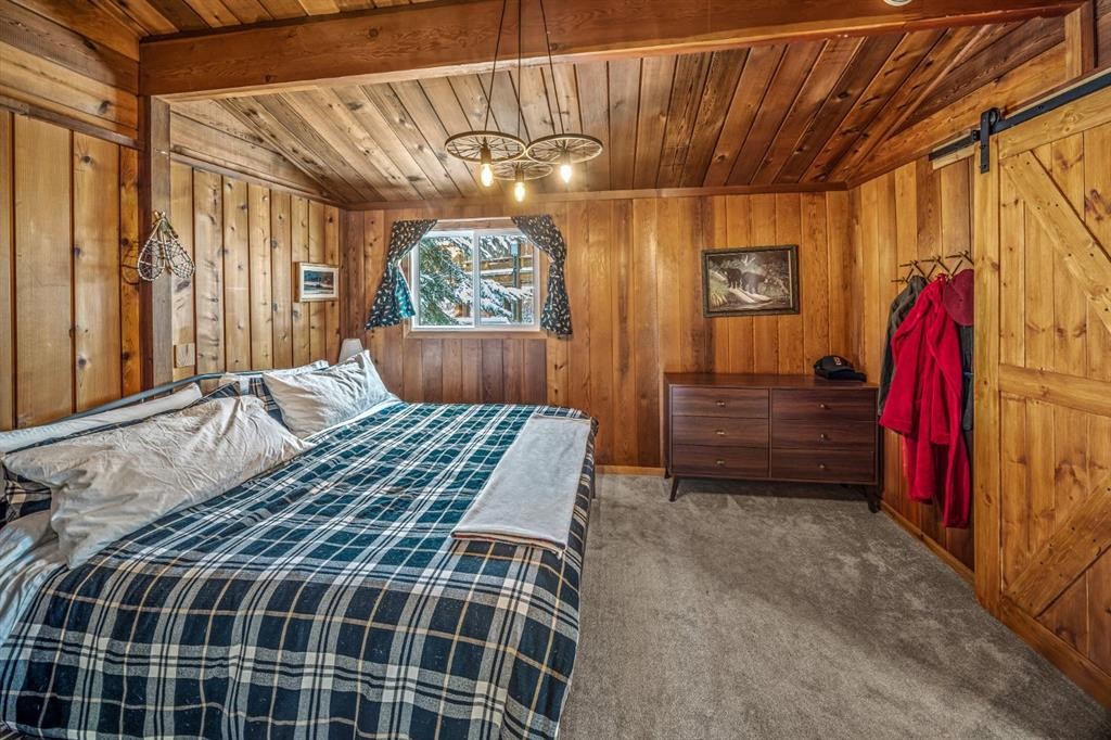 126 Elk Street, Harvie Heights, AB - Indoor Photo Showing Bedroom