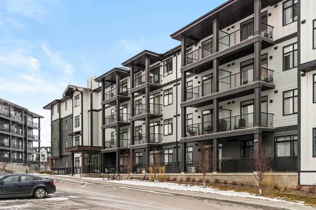 402-50 Sage Hill Nw, Calgary, AB - Outdoor With Balcony With Facade
