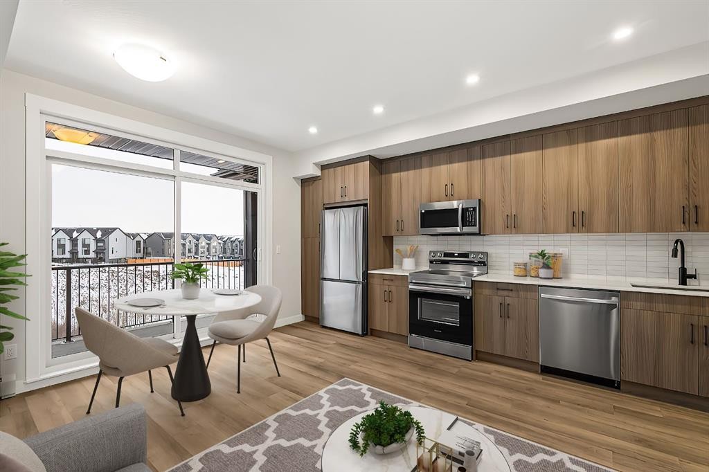 402-50 Sage Hill Nw, Calgary, AB - Indoor Photo Showing Kitchen With Stainless Steel Kitchen