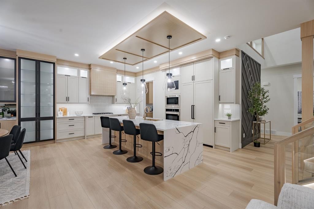 2057 Waterbury Road, Chestermere, AB - Indoor Photo Showing Kitchen With Upgraded Kitchen