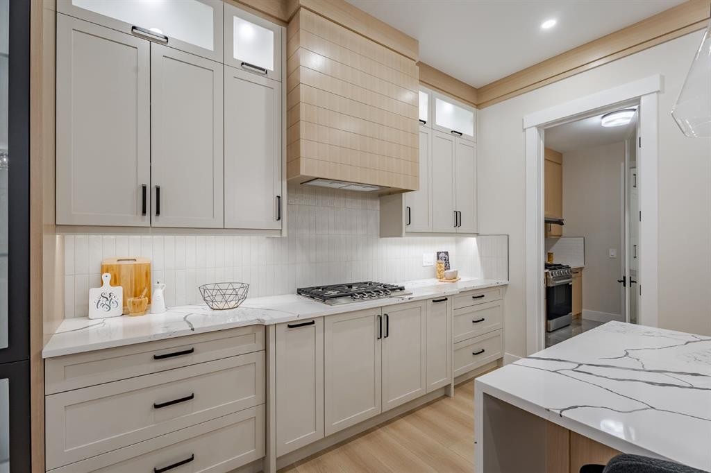2057 Waterbury Road, Chestermere, AB - Indoor Photo Showing Kitchen With Upgraded Kitchen