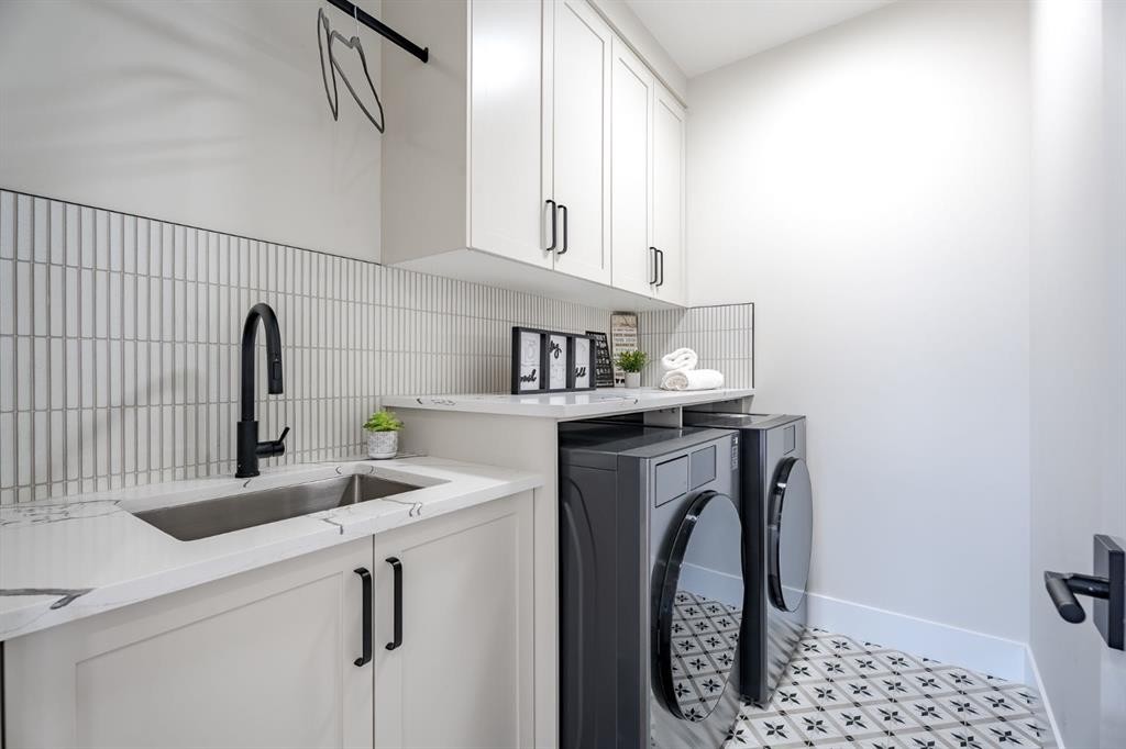 2057 Waterbury Road, Chestermere, AB - Indoor Photo Showing Laundry Room
