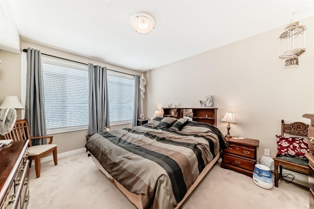 107-1005A Westmount Drive, Strathmore, AB - Indoor Photo Showing Bedroom