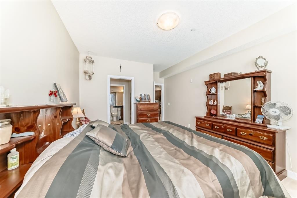 107-1005A Westmount Drive, Strathmore, AB - Indoor Photo Showing Bedroom