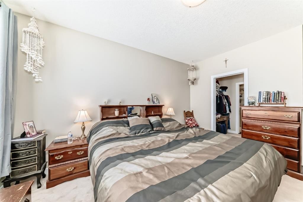 107-1005A Westmount Drive, Strathmore, AB - Indoor Photo Showing Bedroom