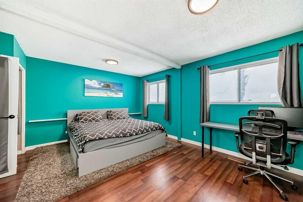644 Spring Haven Court Se, Airdrie, AB - Indoor Photo Showing Bedroom