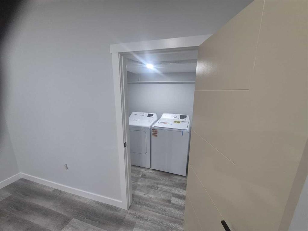 47 Lake Street, Rural Red Deer County, AB - Indoor Photo Showing Laundry Room