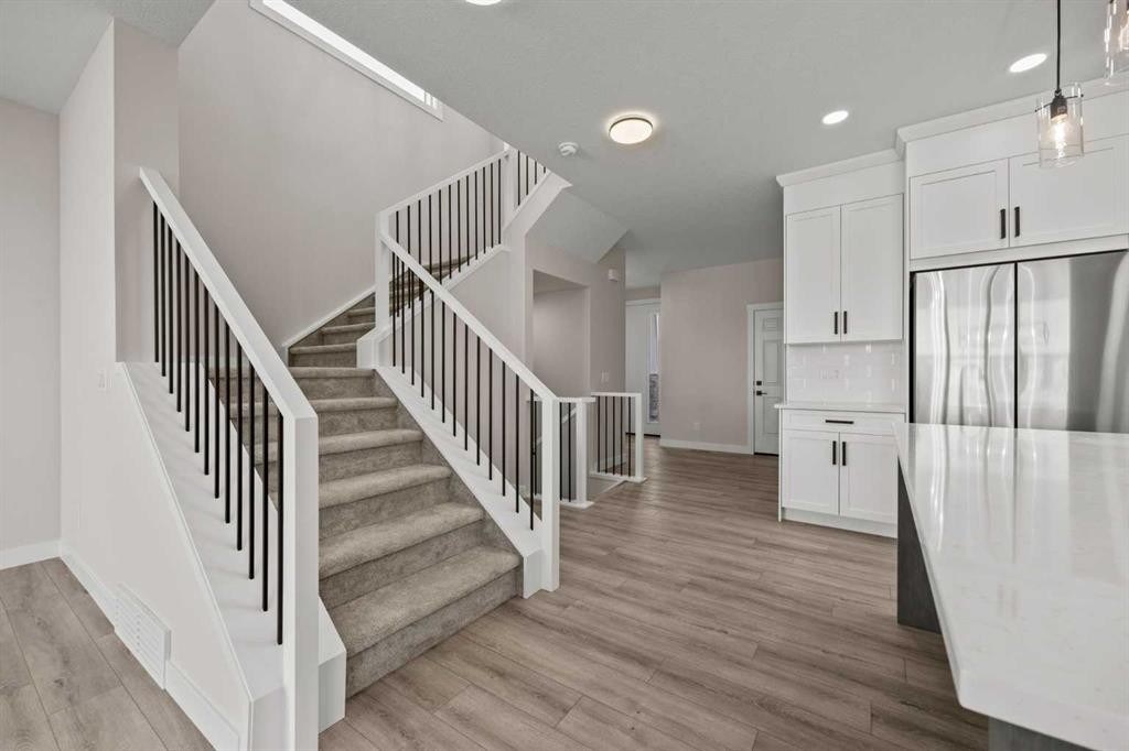 462 Kinniburgh Loop, Chestermere, AB - Indoor Photo Showing Other Room