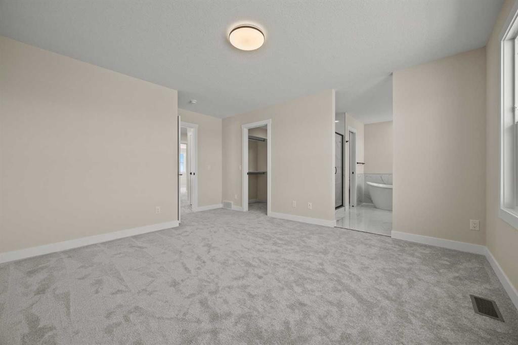 462 Kinniburgh Loop, Chestermere, AB - Indoor Photo Showing Other Room