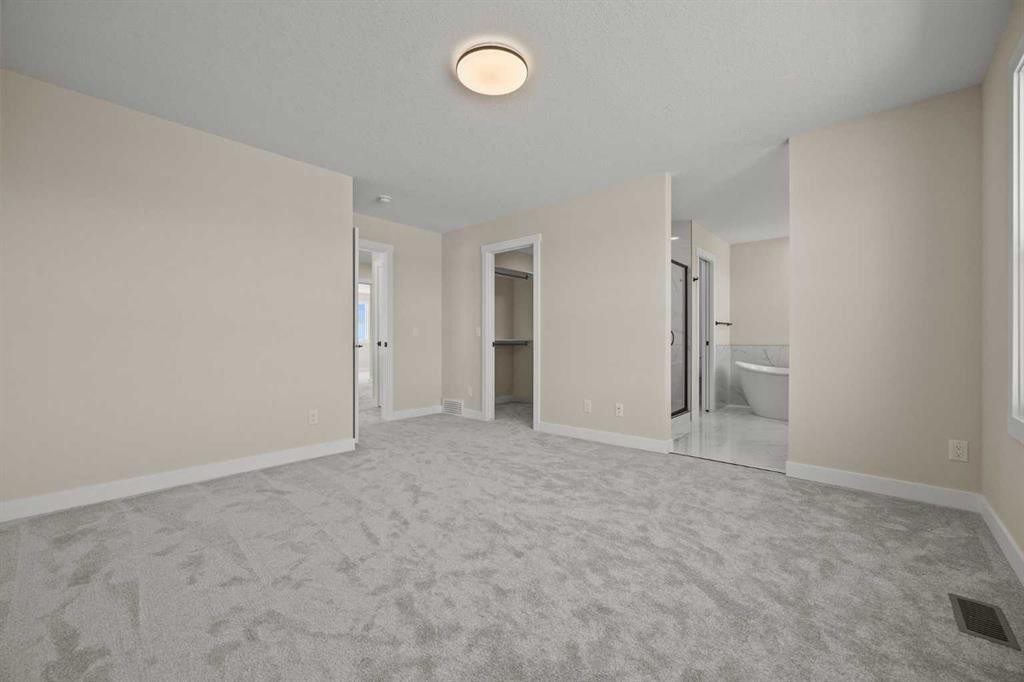 462 Kinniburgh Loop, Chestermere, AB - Indoor Photo Showing Other Room