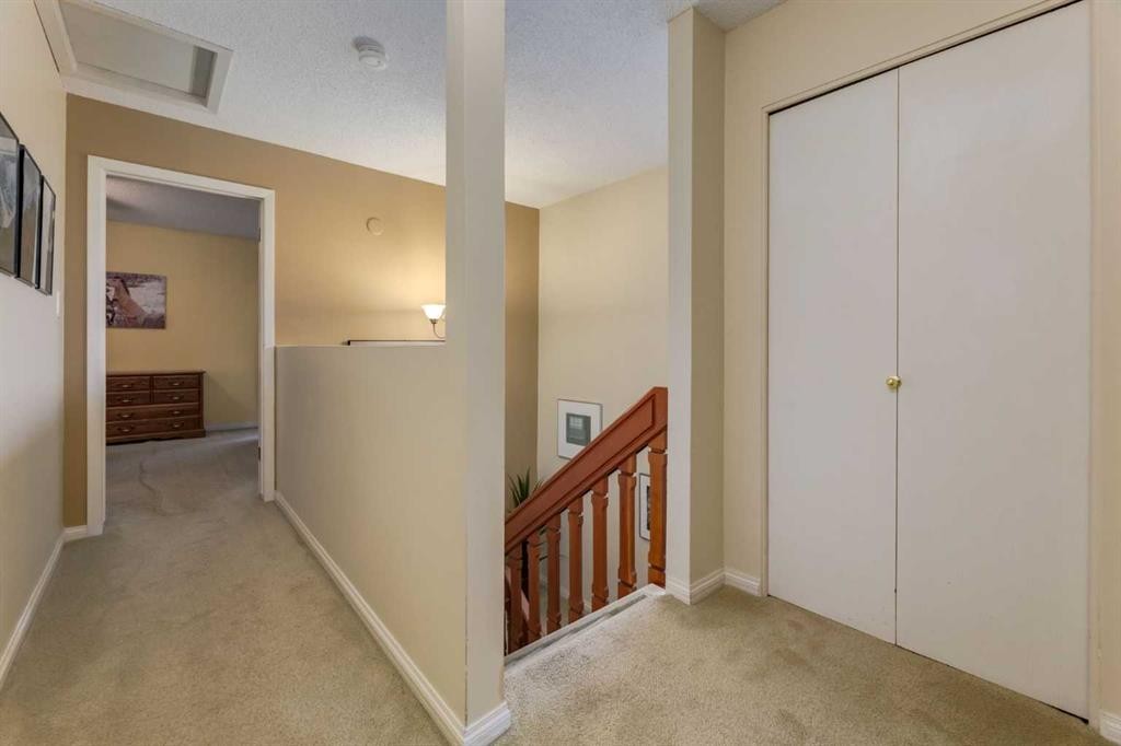 59-10030 Oakmoor Way Sw, Calgary, AB - Indoor Photo Showing Other Room