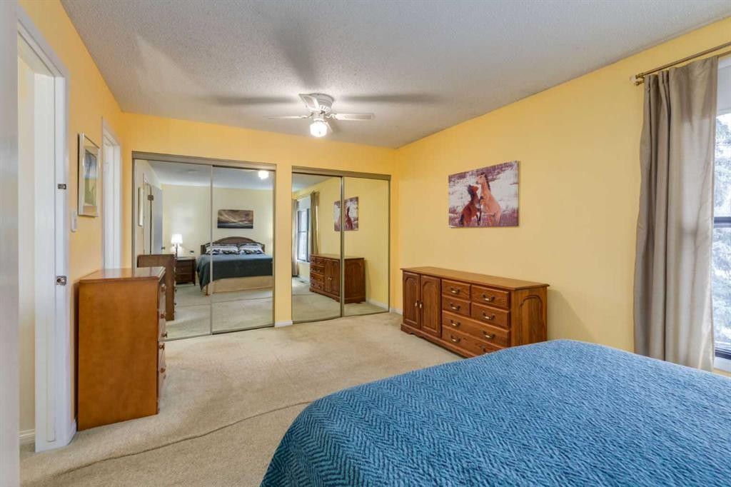59-10030 Oakmoor Way Sw, Calgary, AB - Indoor Photo Showing Bedroom