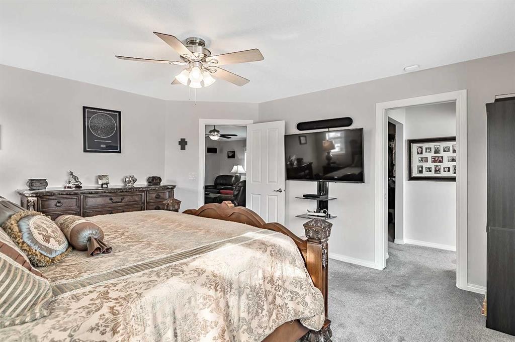 6 Drake Landing Loop, Okotoks, AB - Indoor Photo Showing Bedroom