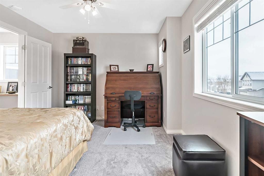 6 Drake Landing Loop, Okotoks, AB - Indoor Photo Showing Bedroom