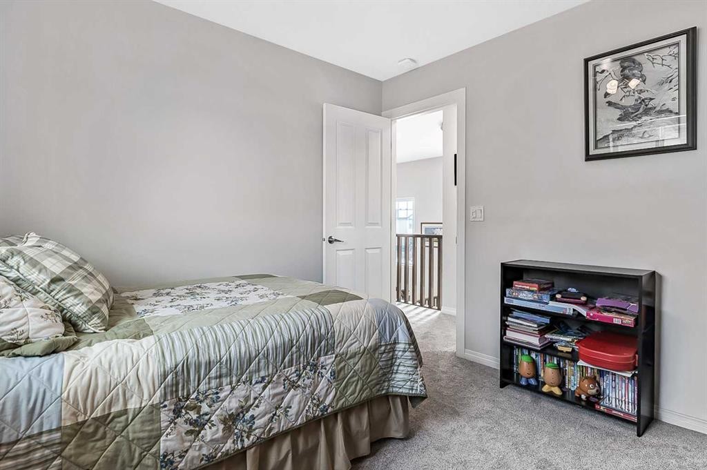 6 Drake Landing Loop, Okotoks, AB - Indoor Photo Showing Bedroom