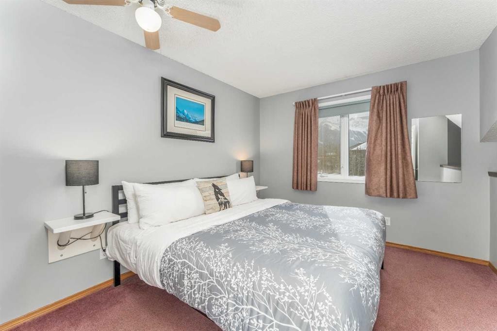 140-1202 Bow Valley Trail, Canmore, AB - Indoor Photo Showing Bedroom