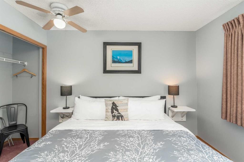 140-1202 Bow Valley Trail, Canmore, AB - Indoor Photo Showing Bedroom