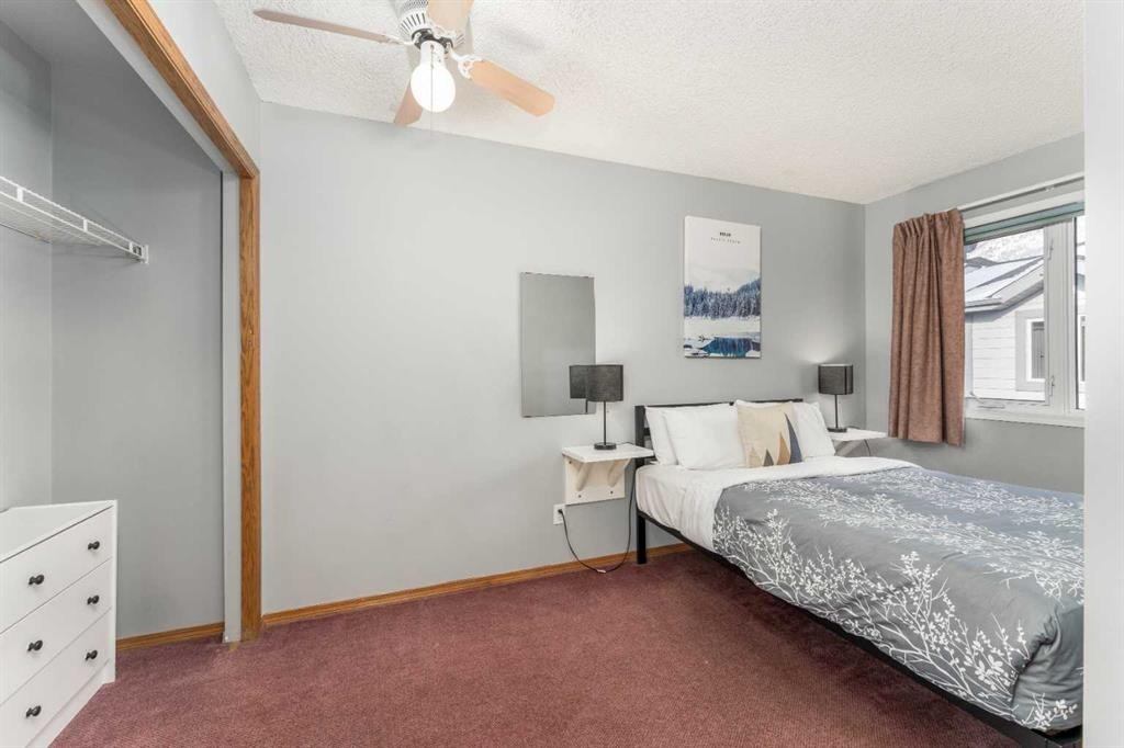 140-1202 Bow Valley Trail, Canmore, AB - Indoor Photo Showing Bedroom