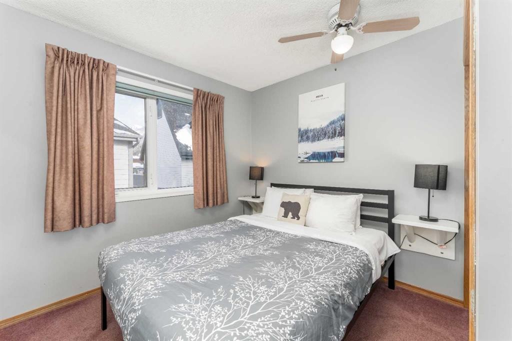 140-1202 Bow Valley Trail, Canmore, AB - Indoor Photo Showing Bedroom