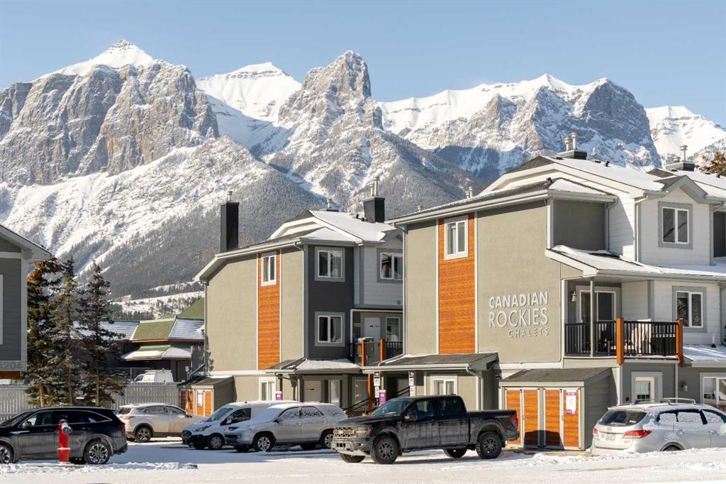 140-1202 Bow Valley Trail, Canmore, AB - Outdoor With Balcony With Facade