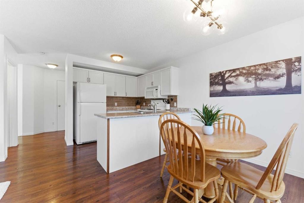 84 Mt Apex Green Se, Calgary, AB - Indoor Photo Showing Dining Room