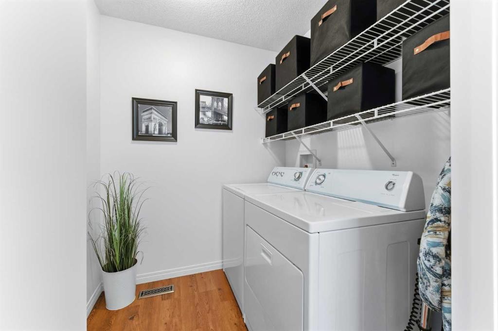 84 Mt Apex Green Se, Calgary, AB - Indoor Photo Showing Laundry Room