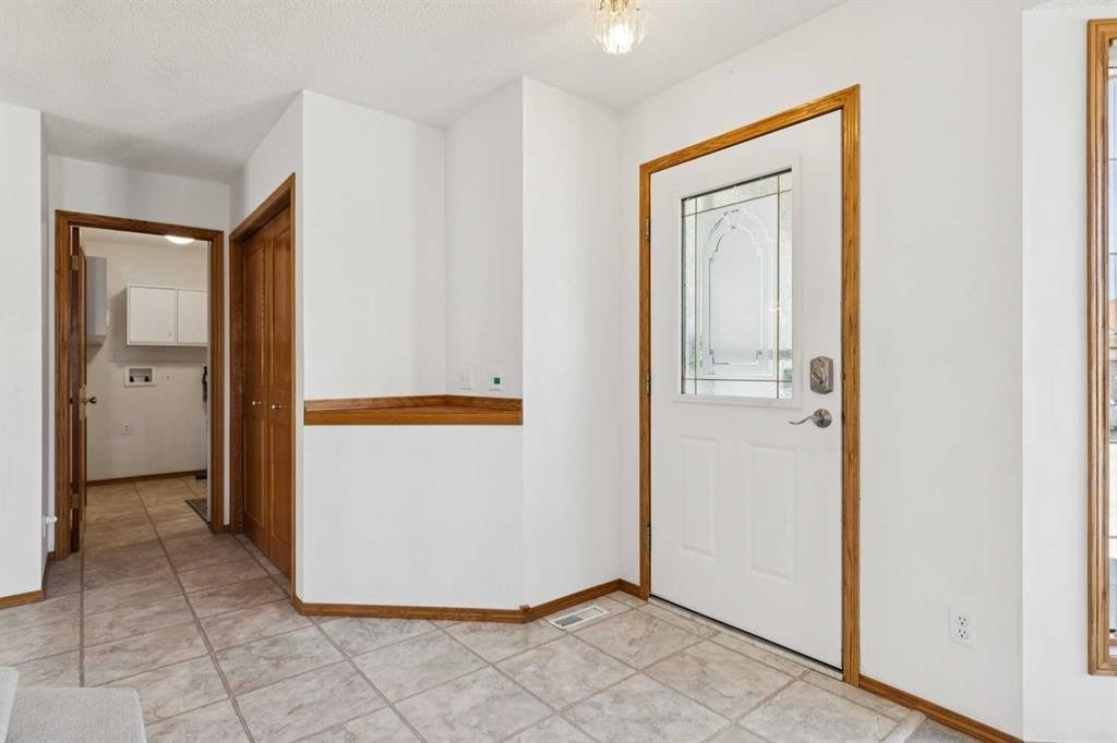 135 Sceptre Close Nw, Calgary, AB - Indoor Photo Showing Other Room