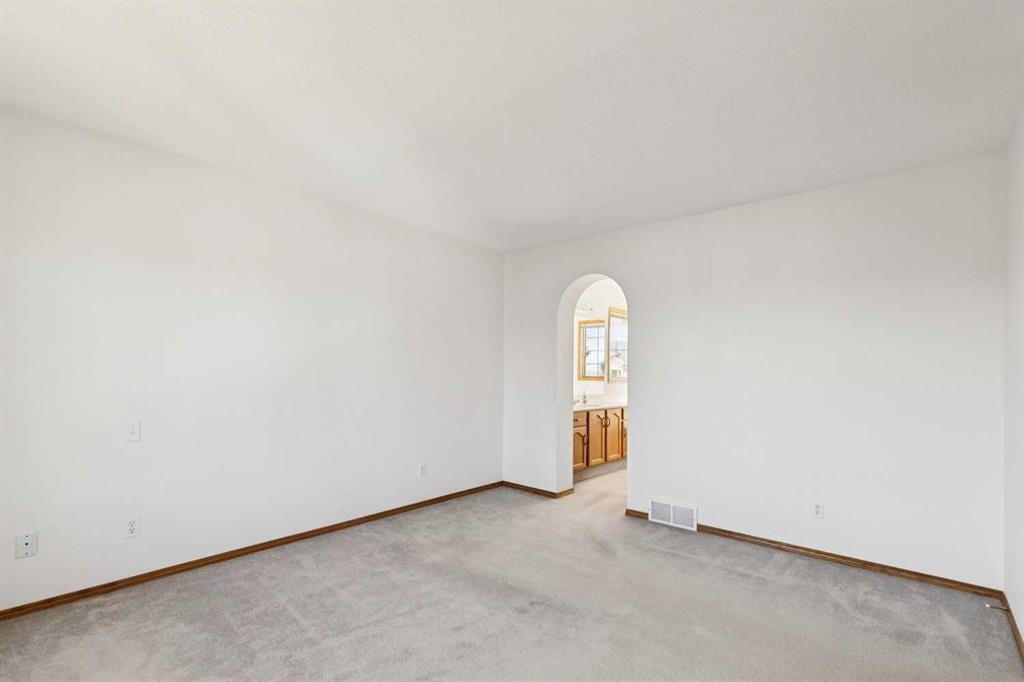 135 Sceptre Close Nw, Calgary, AB - Indoor Photo Showing Other Room