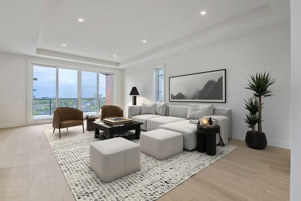 712 Bridge Crescent Ne, Calgary, AB - Indoor Photo Showing Living Room