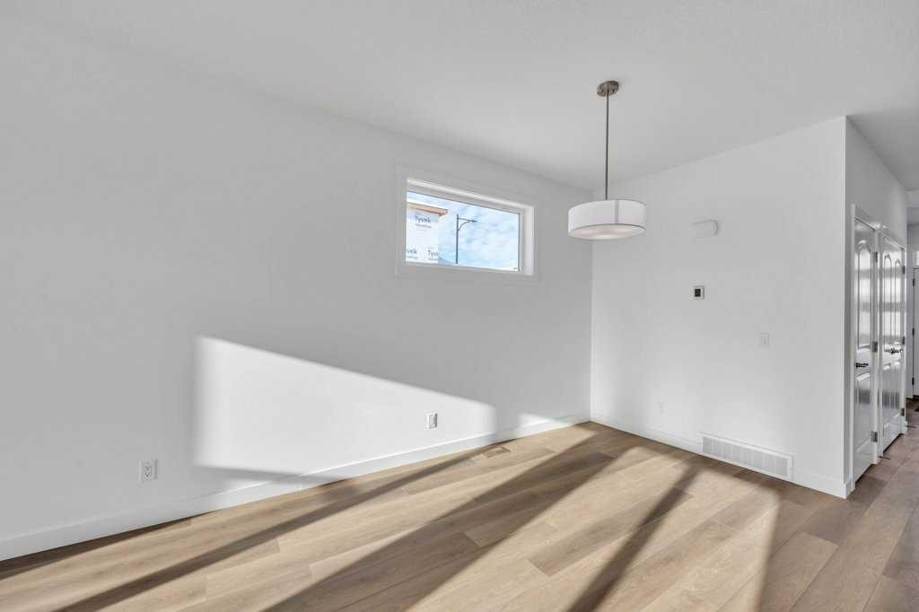 1115 Chinook Winds Circle Sw, Airdrie, AB - Indoor Photo Showing Other Room