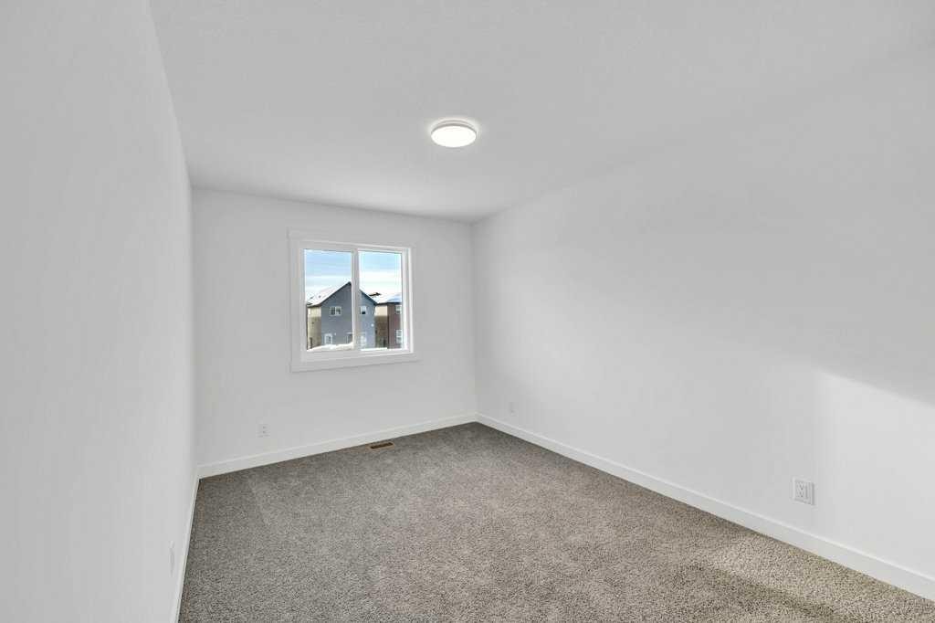 1115 Chinook Winds Circle Sw, Airdrie, AB - Indoor Photo Showing Other Room