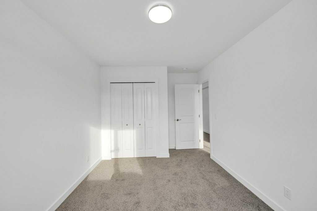 1115 Chinook Winds Circle Sw, Airdrie, AB - Indoor Photo Showing Other Room