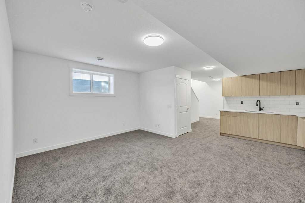 1115 Chinook Winds Circle Sw, Airdrie, AB - Indoor Photo Showing Other Room