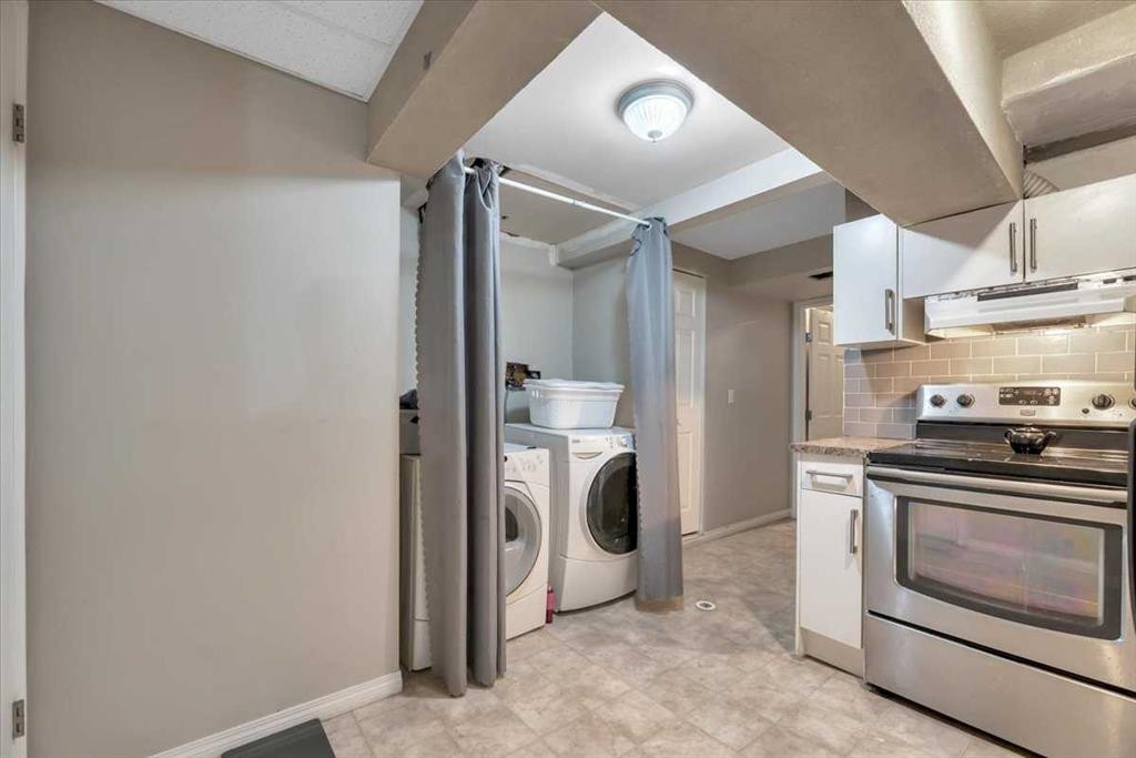 19 Castlepark Way Ne, Calgary, AB - Indoor Photo Showing Laundry Room