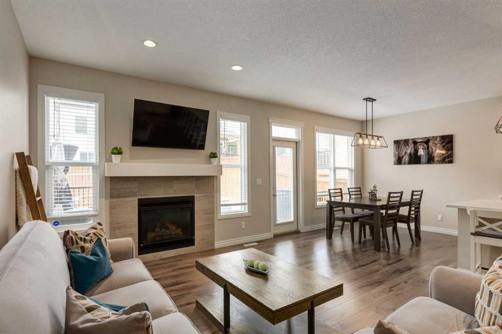 45 Nolanhurst Common Nw, Calgary, AB - Indoor Photo Showing Living Room With Fireplace