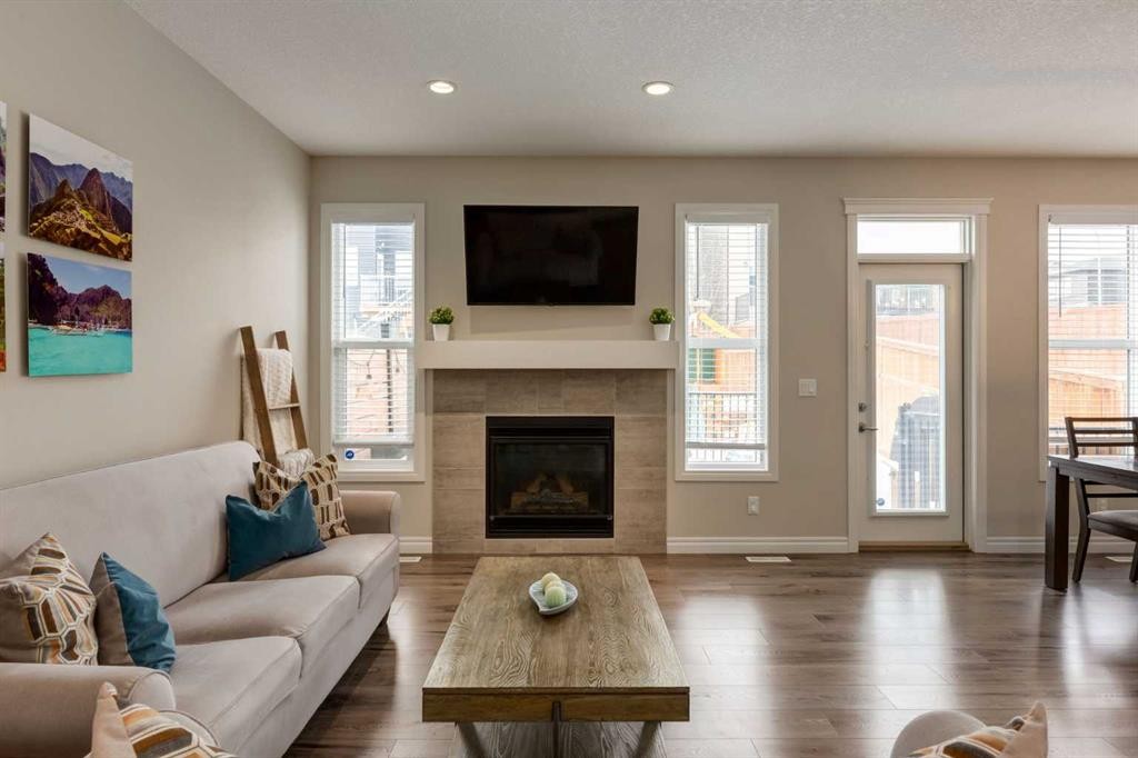 45 Nolanhurst Common Nw, Calgary, AB - Indoor Photo Showing Living Room With Fireplace