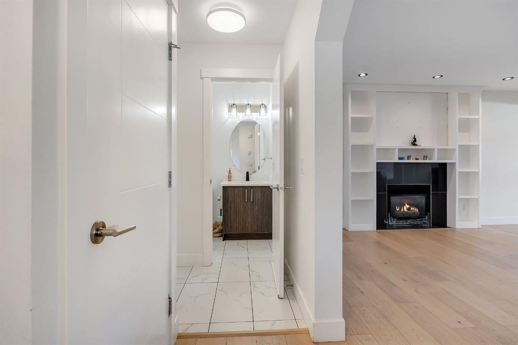 278 Saddlefield Place Ne, Calgary, AB - Indoor Photo Showing Other Room With Fireplace