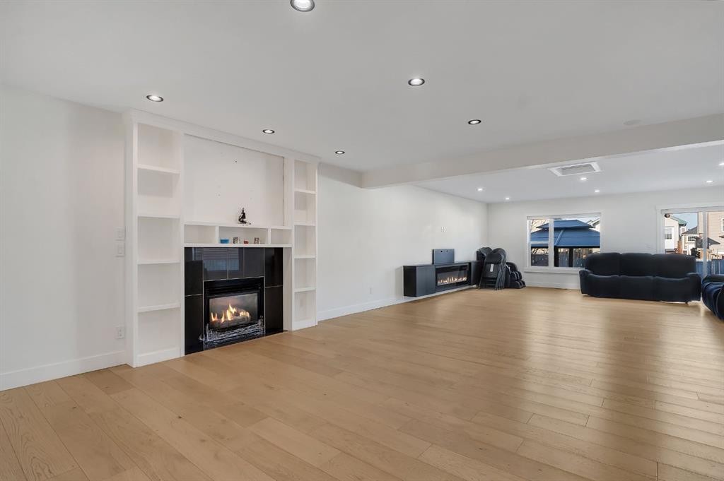278 Saddlefield Place Ne, Calgary, AB - Indoor Photo Showing Living Room With Fireplace
