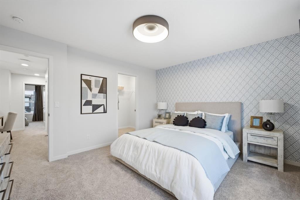 114 Wolf Creek Rise Se, Calgary, AB - Indoor Photo Showing Bedroom