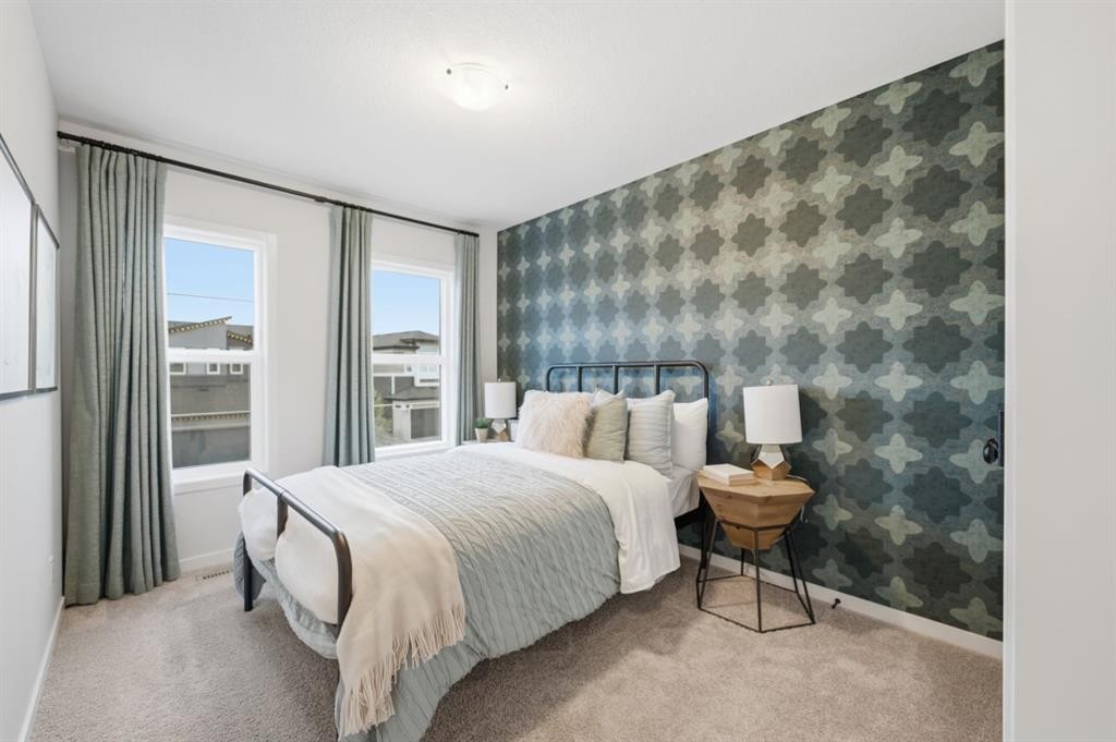 114 Wolf Creek Rise Se, Calgary, AB - Indoor Photo Showing Bedroom